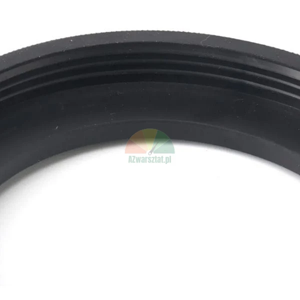 Nahaufnahme einer schwarzen Gummidichtung in Ringform mit sichtbaren Rillen.