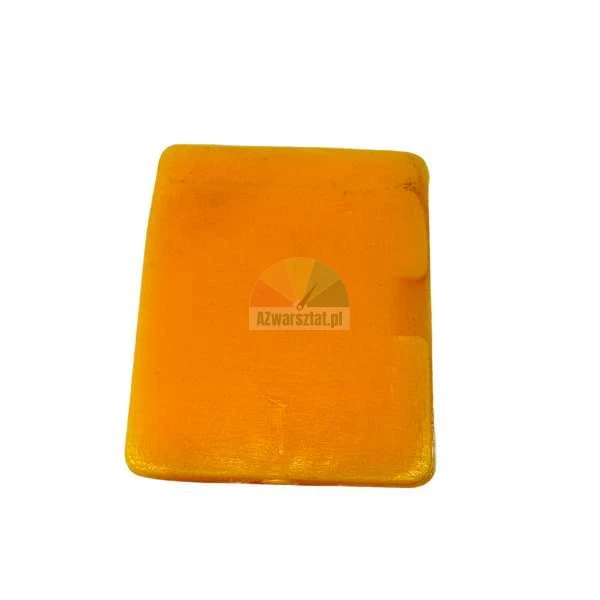 Rechteckiges, oranges Glycerinseifenstück auf weißem Hintergrund.