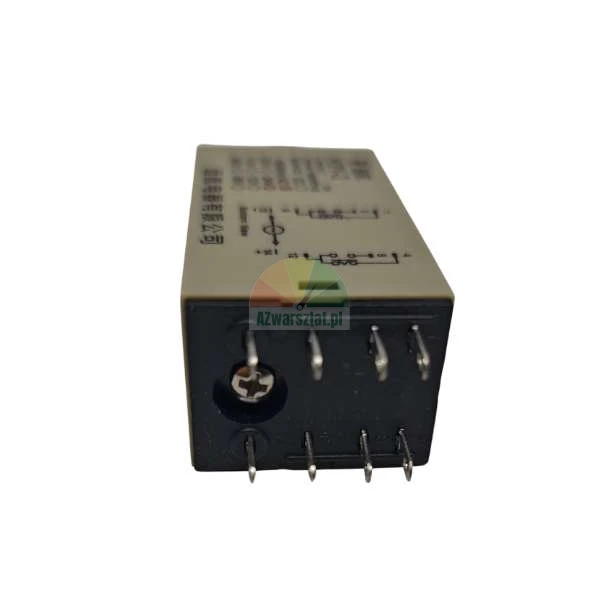 Industrielles elektromagnetisches Relais mit Pins und technischem Diagramm auf dem beigen Gehäuse