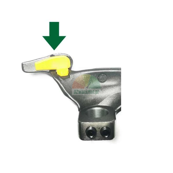Metallmontagekopf mit einem gelben Schutzeinsatz, der durch einen grünen Pfeil gekennzeichnet ist