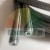 Nahaufnahme eines Stahlseils mit Gewindeendstücken auf weißem Hintergrund.