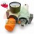 Pneumatische Wartungseinheit OL-MINI mit Druckregler, Manometer, Öler und orangefarbenem Einstellknopf.